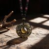 Golden Obsidian Double Dragon Pendant